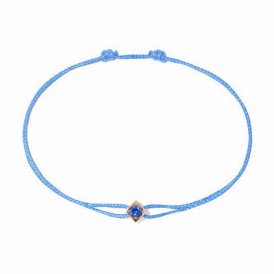 Bracelet sur cordon Le Cube Diamant or jaune et saphir bleu