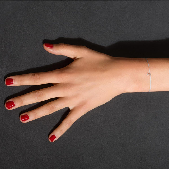 Bracelet BB diamant 0.07ct or blanc cordon noir